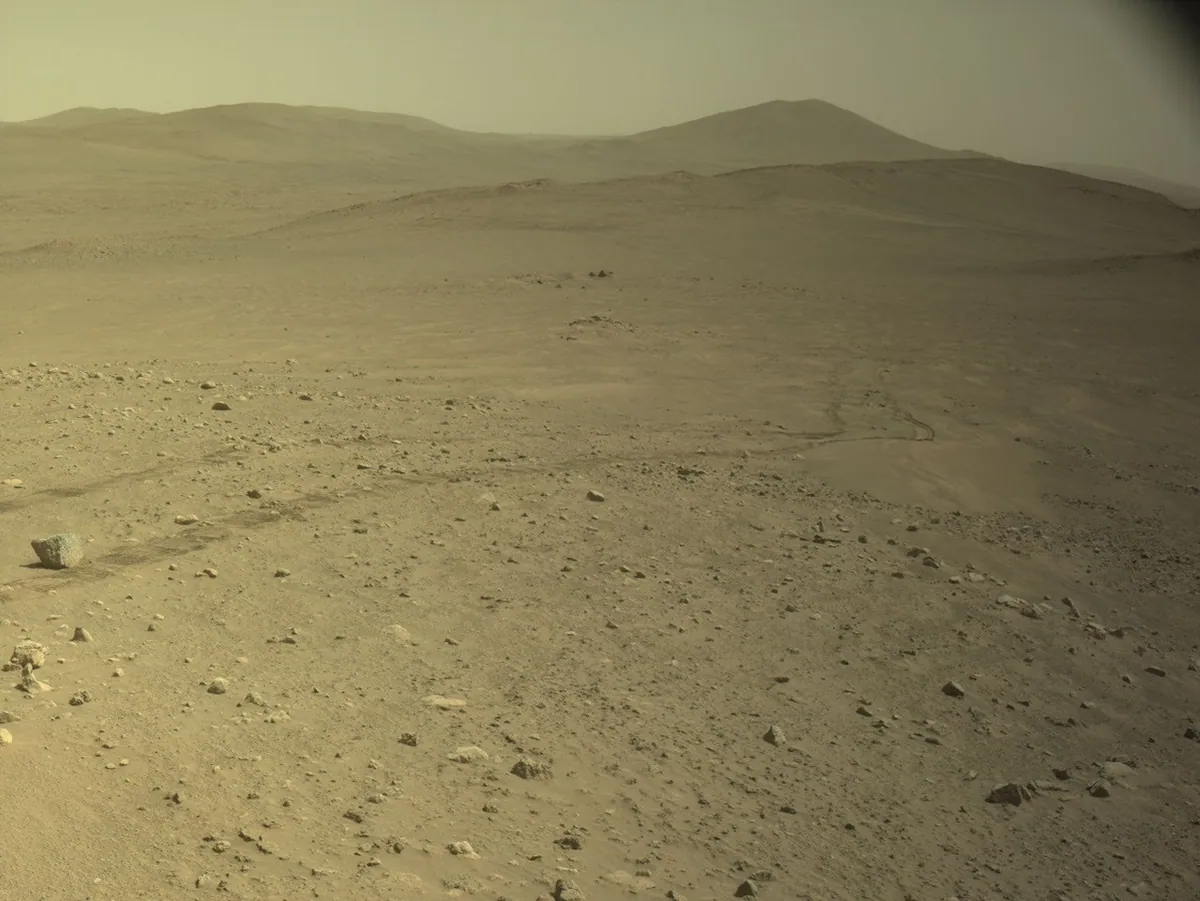 Perseverance's wheel tracks across rocky Martian terrain on 11 October 2026.